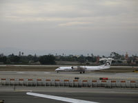 N408QX @ LAX - Horizon Air DHC-8-402 rolling @ LAX - by Steve Nation