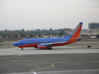 N447WN @ LAX - Southwest 737-7H4 in new colors taxying @ LAX - by Steve Nation