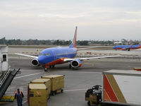N527SW @ LAX - Southwest 737-5H4 in new colors taxying in to gate @ LAX - by Steve Nation