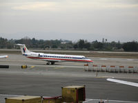 N806AE @ LAX - American Eagle EMB-135KL taxying @ LAX - by Steve Nation