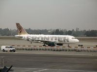 N906FR @ LAX - Frontier A319-111 with Elk on tail taxying @ LAX - by Steve Nation