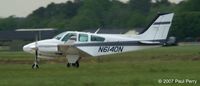 N6140N @ LFI - Takeoff roll, looks like she's on grass - by Paul Perry