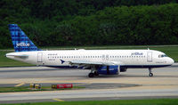 N586JB @ KTPA - Blue Flight Special taxiing in off 36L - by N6701