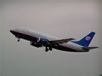 N907UA @ MHT - take off from runway 17 - by John Newall