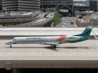 N11193 @ PHX - ExpressJet taxiing across the bridge - by John Meneely