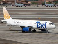 N470UA @ PHX - Taxiing to the gate - by John Meneely