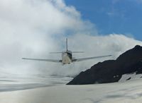 N334DH - Going down the Glacier - by Gwen Brock