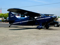 N6486M @ WVI - Midnight blue 1949 Stinson 108-3  as NC6486M @ Watsonville, CA airshow - by Steve Nation