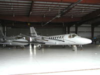 N380RD @ KFCM - Parked inside the Executive Aviation Hangar. - by Mitch Sando