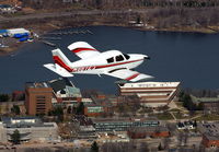 N8872J @ KCMX - Piper N8872J flying low past Michigan Tech University - by Rick Anderson