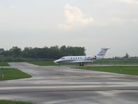 N409SF @ KLVN - Landing Runway 12 from Dupage (DPA). - by Mitch Sando
