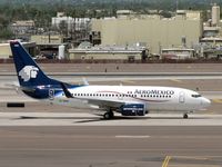 EI-DRD @ PHX - Taxiing to the gate - by John Meneely