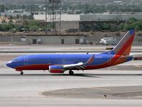 N380SW @ PHX - Recently fitted with winglets - by John Meneely