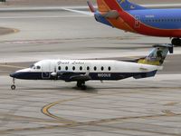 N100UX @ PHX - With Fly Telluride art on the tail - by John Meneely