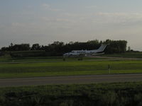 N200WZ @ KLVN - Departing Runway 12 to Des Moines, IA (DSM). - by Mitch Sando