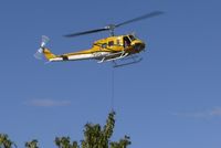 N15HX - UH-1 working fire duty in Pecos River Canyon, New Mexico