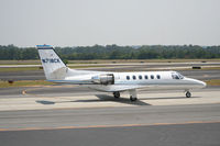 N718CK @ PDK - Taxing back from runup area - by Michael Martin