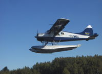 N9877R @ LHD - 1957 DeHavilland BEAVER DHC-2, P&W R-985 450 Hp, multiple certification, landing - by Doug Robertson