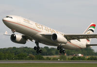 A6-EYG @ EGCC - Etihad 330 departing 23L - by Kevin Murphy