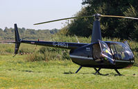 G-PROJ @ EGHH - Robinson R44 - by Les Rickman