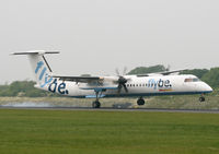 G-JEDL @ EGCC - Wobbly landing for Flybe - by Kevin Murphy
