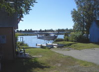 N9211T @ LHD - 1960 Cessna 180C SKYWAGON, Continental O-470 230 Hp, floatplane at private dock - by Doug Robertson