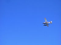UNKNOWN @ LHD - Cessna, takeoff climbing turn - by Doug Robertson