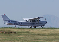 N403FR @ KAPA - Taxi with Pikes peak in the background - by Bluedharma