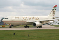 A6-EYI @ EGCC - Etihad A.330 at the threshold - by Kevin Murphy