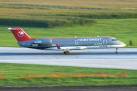 N8477R @ CID - Arriving on runway 27 - by Glenn E. Chatfield