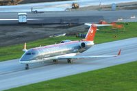 N8477R @ CID - Taxiing in to the ramp - by Glenn E. Chatfield