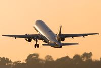 N595JB @ LGB - Rhythm & Blues (FLT JBU252) climbing out from RWY 30 enroute to Metropolitan Oakland Int'l (KOAK) late in the day. [Canon 20D + Canon 300mm f/2.8L + 1.4x teleconverter] - by Dean Heald