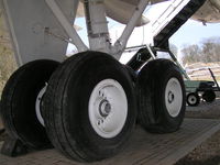 A4O-AB - Main landing gear of the aircraft. - by Neil Lomax