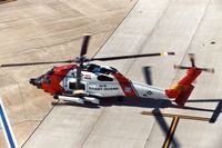 6035 @ CID - HH-60J at the base of the control tower - by Glenn E. Chatfield