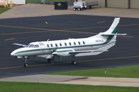 N850LS @ CID - Odd looking modifications.  Taxiing for departure - by Glenn E. Chatfield