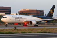 N319UP @ LGB - United Parcel Service (UPS) N319UP (FLT UPS905) departing RWY 30 enroute to Louisville Intl-Standiford Field (KSDF). - by Dean Heald