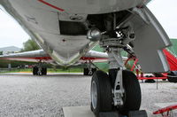 G-AWZK @ EGCC - View of the offset nose gear. - by Trident Man