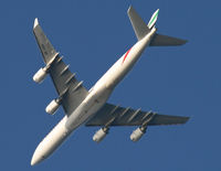 A6-ERH @ KJFK - An Italian Boeing Triple-7 glides serenly over New Jersey's Sandy Hook on it approach to JFK. - by Daniel L. Berek