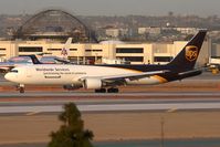 N327UP @ LAX - UPS N327UP (FLT UPS2920) from Louisville Int'l (KSDF) exitting RWY 25L after arrival. - by Dean Heald