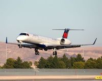 N14173 @ LAS - Delta Connection (by ExpressJet) N14173 (FLT BTA7727) from Salt Lake City Int'l (KSLC) on short-final to RWY 25L. - by Dean Heald