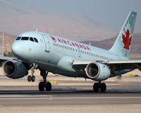 C-GAQX @ LAS - Air Canada C-GAQX (FLT ACA544) from Vancouver Int'l (CYVR) landing on RWY 25L. - by Dean Heald