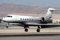 N383LS @ LAS - Las Vegas Sands Corporation's 1998 Gulfstream G-V N383LS landing RWY 25L. - by Dean Heald