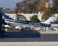 N2420J @ SMO - 1966 Cessna 150G N2420J climbing out from RWY 21. - by Dean Heald