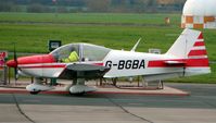 G-BGBA @ EGBJ - Busy late afternoon at Gloucestershire (Staverton) Airport - by Terry Fletcher