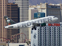 N946FR @ KLAS - Frontier Airlines - 'Perry - the Horned Puffin' / 2006 Airbus A319-111 - by Brad Campbell