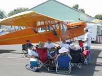 N76F @ MCE - Relaxing in the shade of the Mayor's Trophy winner at the 2006 Merced Antique fly-in - by BTBFlyboy
