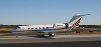 N460QS @ PDK - Taxing to Signature Flight Services - by Michael Martin