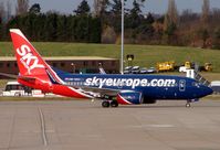 OM-NGC @ EGBB - Sky Europe's colourful B737-700 taxies in at BHX - by Terry Fletcher