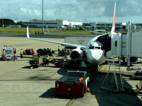 VH-VXP @ YBBN - Our flight being prepared at Brisbane Airprt - by aussietrev