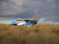 ZK-JBN - JBN - Pegged down in NZ native tussock.  Ruahine Corner airstrip,  Ruahine Forest Park, NZ - by Damon Wise